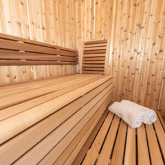 Western Red Cedar  The benches are clear red cedar. Knotty cedar on walls and roof